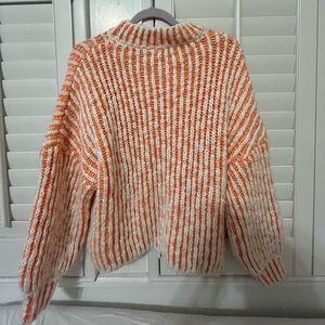 Orange striped POL knit sweater. Size L.